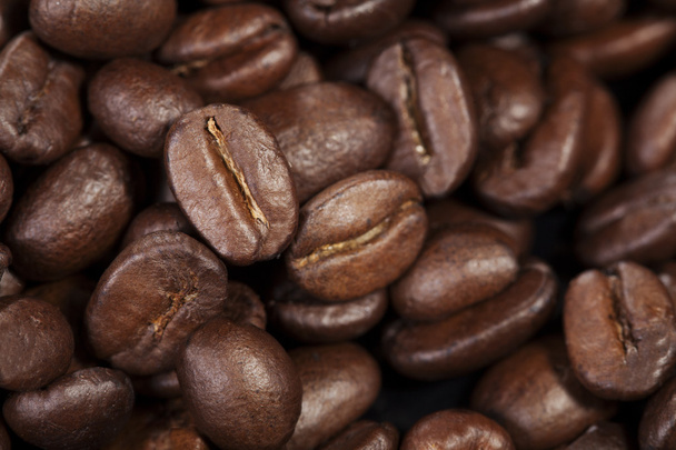 Texture of freshly roasted coffee beans - Fotoğraf, Görsel