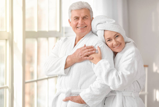 Morning of mature couple in bathroom - Photo, Image