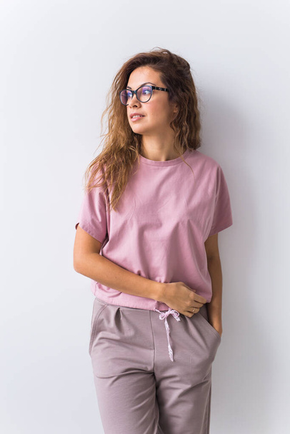 Warm pink kit for homewear. Soft cotton t-shirt and pants. Comfortable clothes for healthy sleep. Pajamas concept - Zdjęcie, obraz