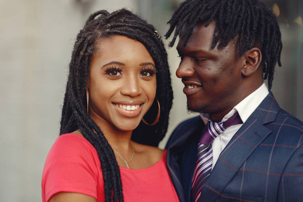 Stylish black couple spending time in a spring city - Photo, image