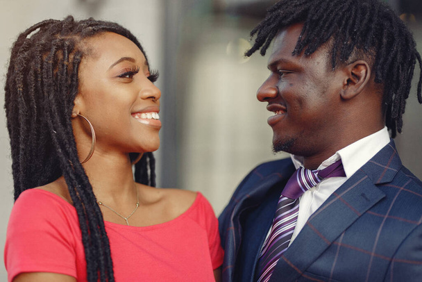Stylish black couple spending time in a spring city - Photo, Image