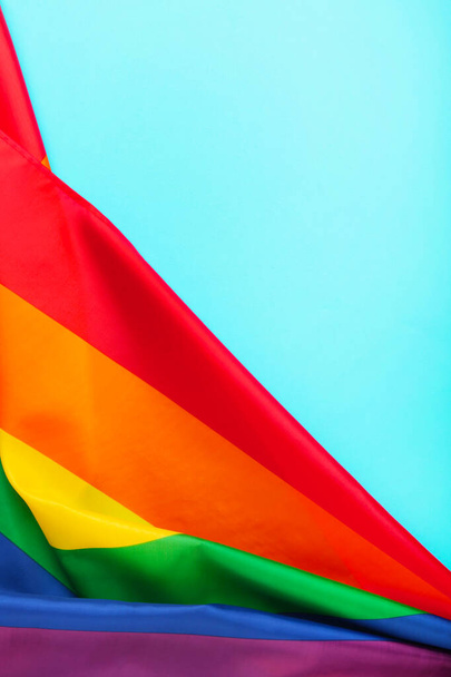 Rainbow LGBT flag on yellow background, top view - Foto, Bild