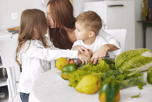 Family prepare the salad in a kitchen - Fotografie, Obrázek