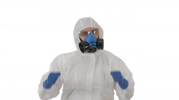 Male doctor in hazamat suit making victory gestures on white background. - Záběry, video