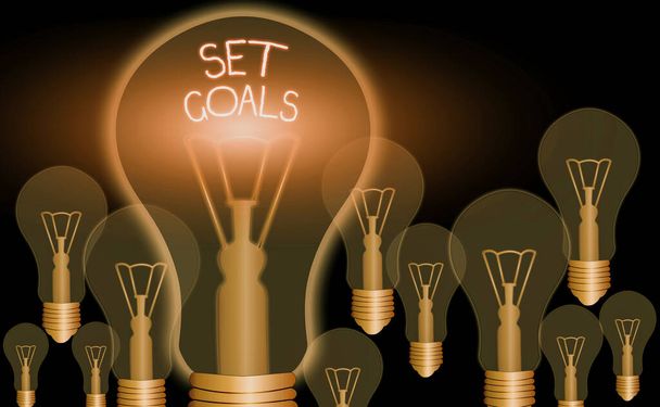 Escrevendo nota mostrando Set Goals. Foto de negócios mostrando Definir ou alcançar algo no futuro com base no plano
. - Foto, Imagem