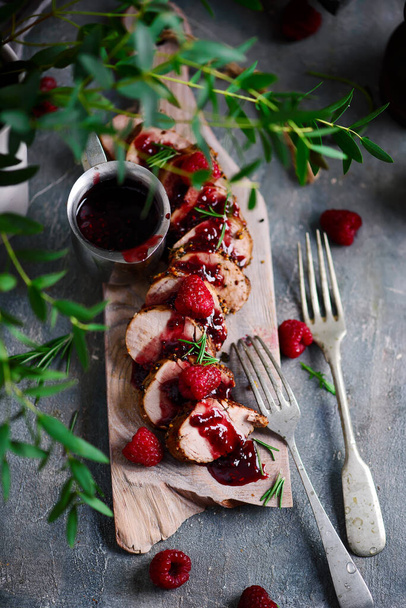 Pork tenderloin with raspberry sauce.style vintage.selective focus - Photo, Image