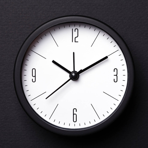 Balck Alarm Clock on black background. - Photo, Image