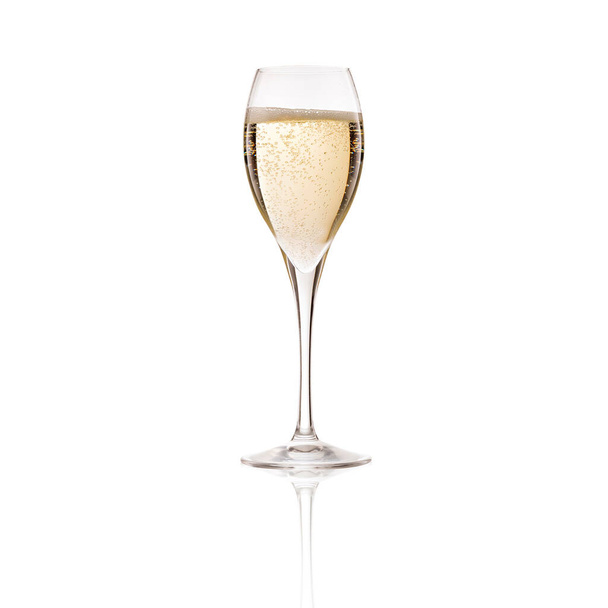 Cold fancy champagne bubbling and fizzing in transparent glass goblet on white background - Fotoğraf, Görsel