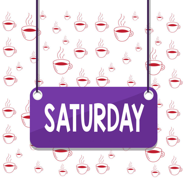 Writing note showing Saturday. Business photo showcasing First day of the weekend Relaxing time Vacation Leisure moment Board color background plank attached string panel rectangle. - Photo, Image