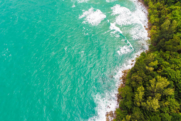 Wave on beautiful sea beach with green tree aerial view - Photo, image
