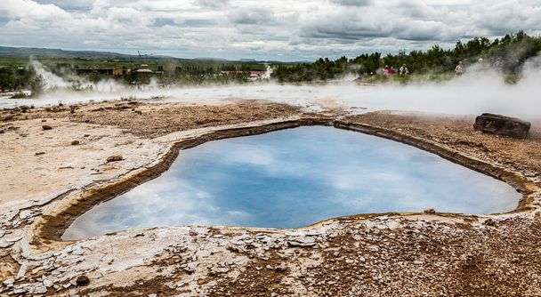 Hot springs in Haukadalur geothermal area along the golden circle, western Iceland - Foto, afbeelding