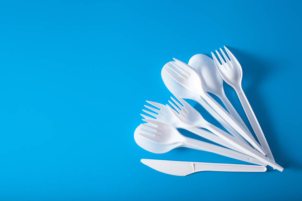single use plastic forks, spoons. concept of recycling plastic, plastic waste - Photo, Image