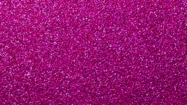 shimmering and sparkling glittery magenta background and with many reflections and plays of lights - Footage, Video
