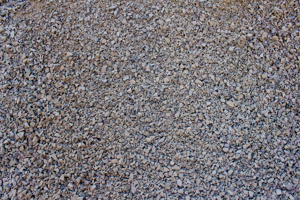 migalha de pedra como fundo texturizado criativo para o seu design, fundo de cascalho de granito com copyspace
 - Foto, Imagem