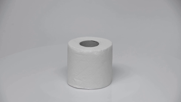 soft and clean toilet paper rolling on white with copy space - 映像、動画