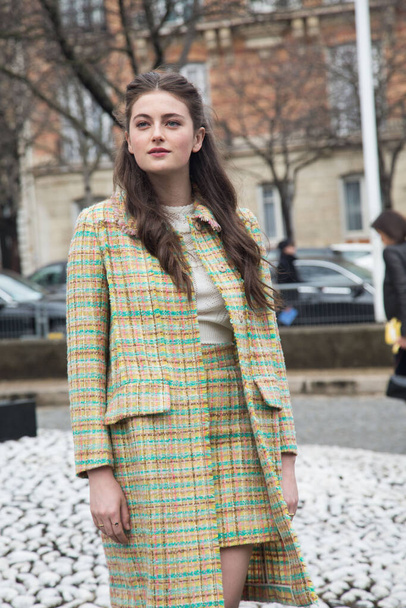 Millie Brady  arrives to the Miu Miu show at Place de Iena during Paris Fashion Week FW 16/17 on March 9, 2016 in Paris, France. - Photo, image