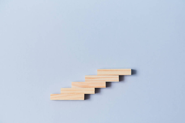 Stairway of wooden planks mockup, place for text. Goal achievement. Professional growth and development. Career ladder - Photo, image