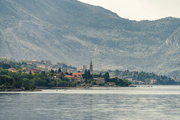 Sunny view of beautiful village Orahovac on Kotor Bay, Montenegro. - Foto, Bild