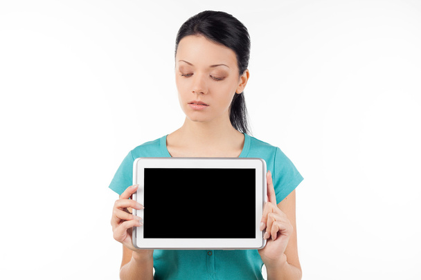 Woman holding digital tablet - Valokuva, kuva