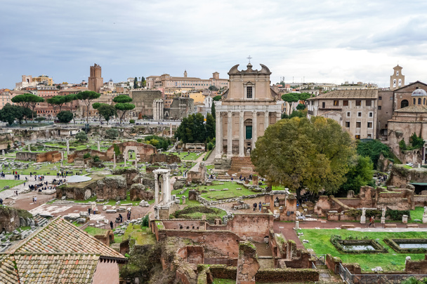 historical ruins of roman forum against blue sky with clouds in rome - Photo, Image