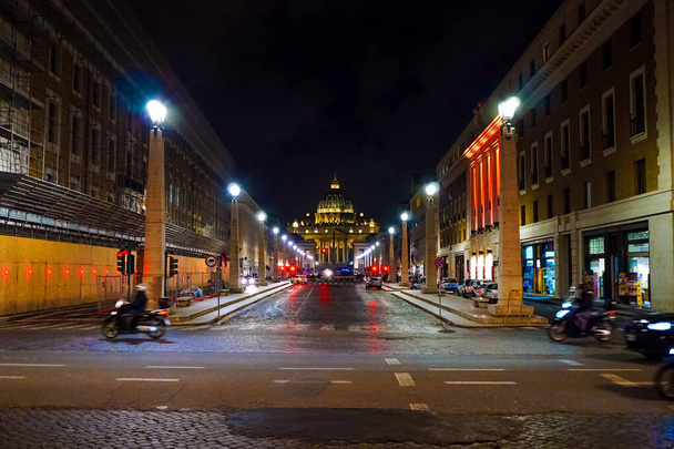 VATICAN CITY, ITALY - APRIL 10, 2020: motion blur of ancient st peters basilica at night  - Φωτογραφία, εικόνα