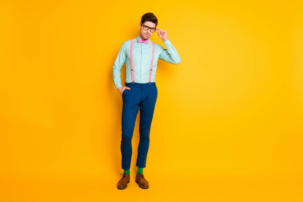 Full length photo of imposing charismatic guy touch spectacles want attract woman wear stylish clothes isolated over vivid color background - Zdjęcie, obraz
