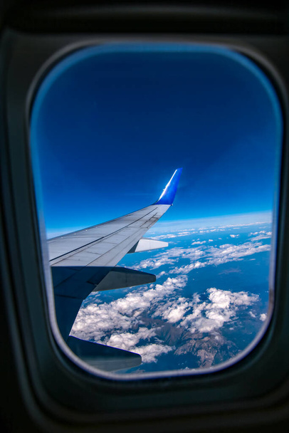 вид з вікна літака, хмари, туризм
 - Фото, зображення