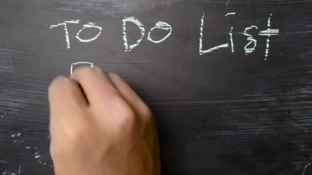 To Do List! written with color chalk. Supported by an additional services. Blackboard concept - Footage, Video