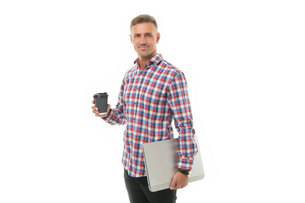 On my way to success. Regular office worker concept. Work from home. Handsome man enjoying coffee to go. Happy hipster holding laptop and coffee cup white background. Coffee wakes me up in morning - Foto, immagini