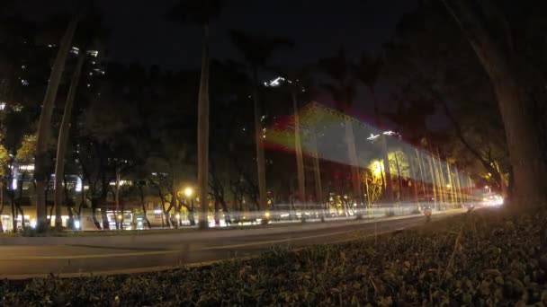 4k Timelapse of night, Traffic cars crossing urban street near to the park-Dan - Footage, Video