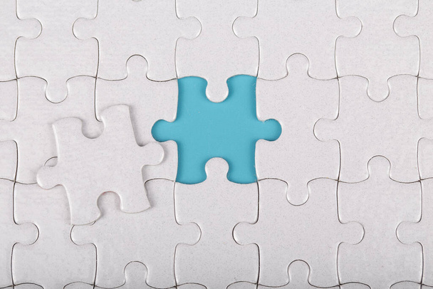 The last piece of white jigsaw puzzle. - Foto, Imagen