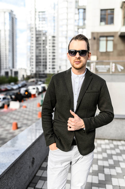 Guy in sunglasses in smart casual clothes - Photo, Image