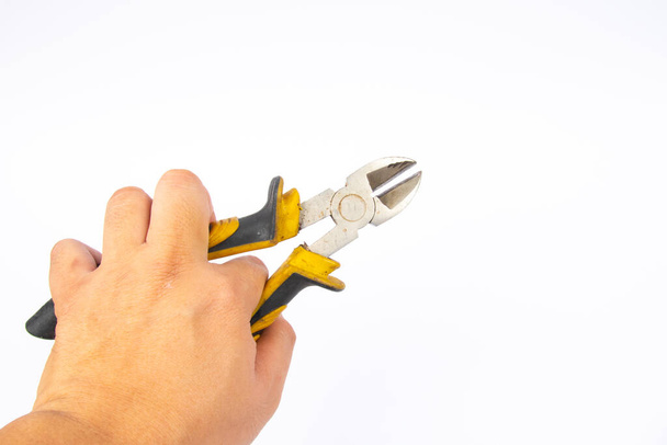 Side cutters with yellow and grey handle on white background. - Photo, Image