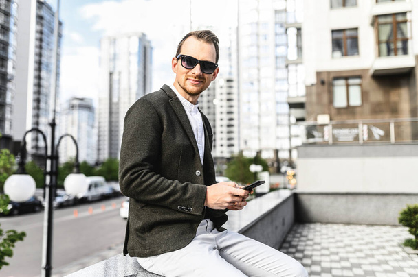 Guy in sunglasses in smart casual clothes - Zdjęcie, obraz
