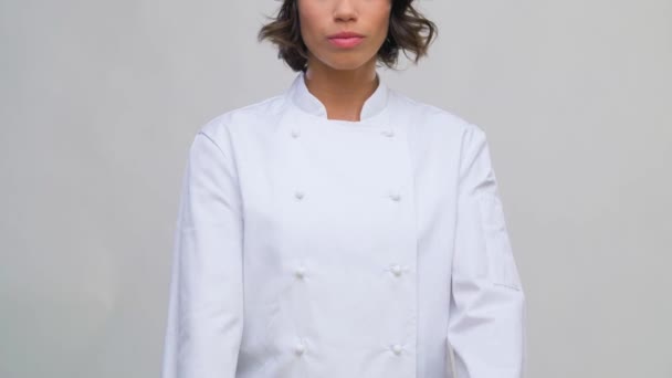 smiling female chef in toque - Video, Çekim