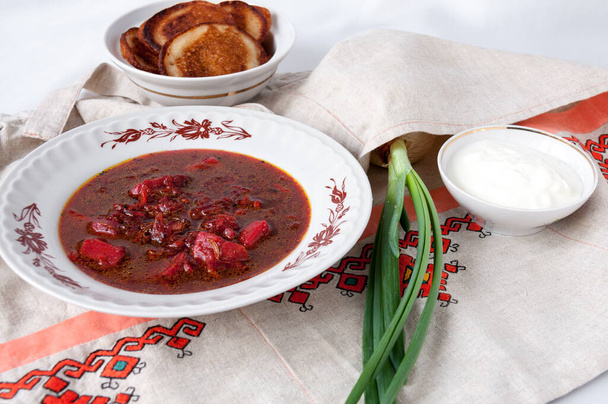 Ukrainian borsch  made from beets and green onions for lunch - Fotoğraf, Görsel