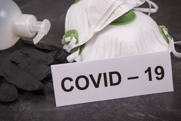 Disinfectant liquid with alcohol for disinfection hands and protective mask N95. Stop spreading outbreak coronavirus. Covid-19. 2019-nCoV - Photo, Image