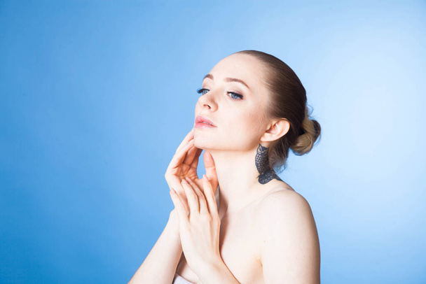 portrait of a young woman with soft skin after Spa treatments and cosmetics - 写真・画像