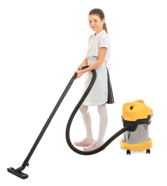 Cute little chambermaid with vacuum cleaner on white background - Photo, image