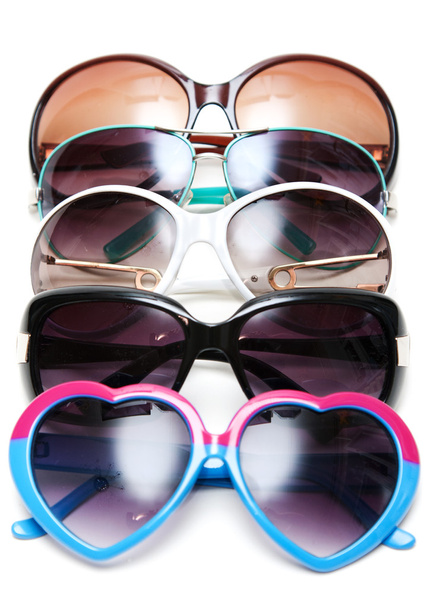 Much sunglasseses put in row - Photo, image