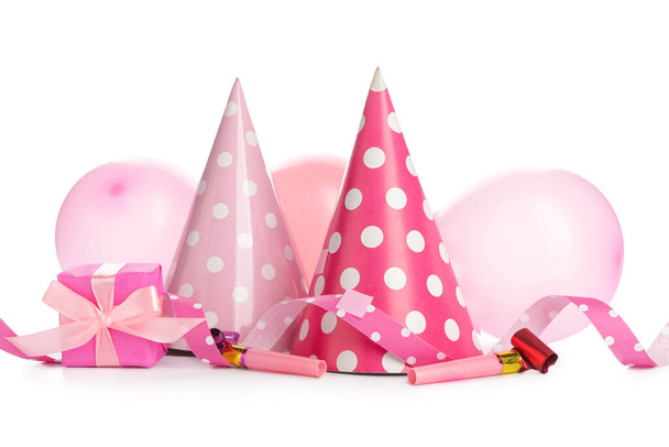 Party hats and decor on white background - Photo, Image