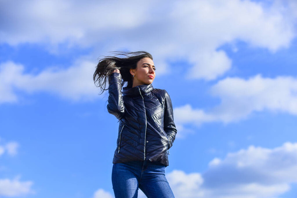 Beauty and fashion look. Feel free windy day. Woman enjoying cool weather. Freshness of morning. Explore your true style. Girl spring jacket blue sky background. Woman fashion model outdoors - Fotoğraf, Görsel
