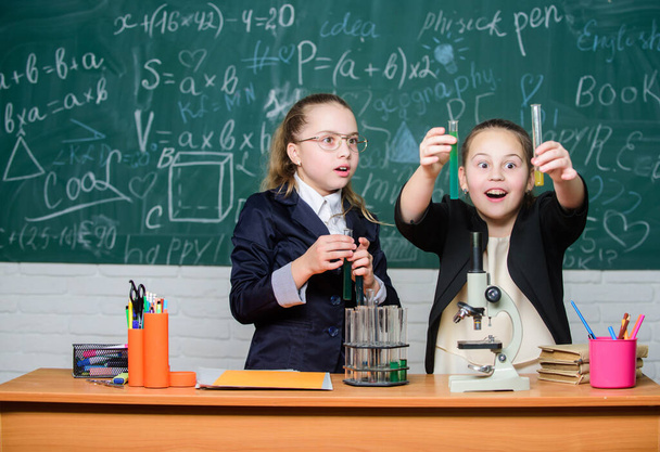 Biology lab. Breathing life into chemistry. science experiments in laboratory. Little girls genius in school lab. Science lab. Little girls scientist with microscope. Chemistry research in laboratory - Foto, Bild