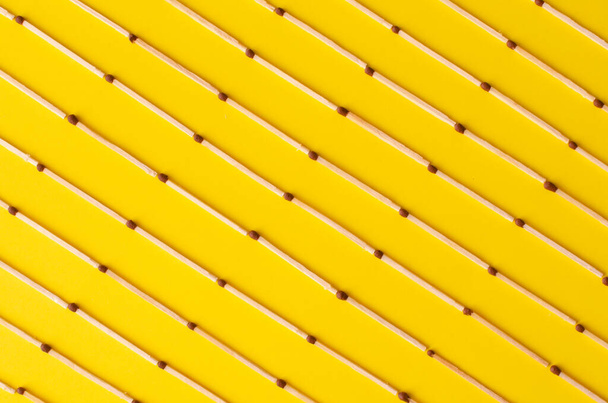 Matches on peach background. Top view. Matches pattern. - Foto, immagini
