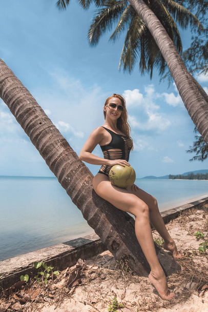 Young beautiful fit sexy female bikini model pose at Lipa Noi beach Thailand - Fotografie, Obrázek