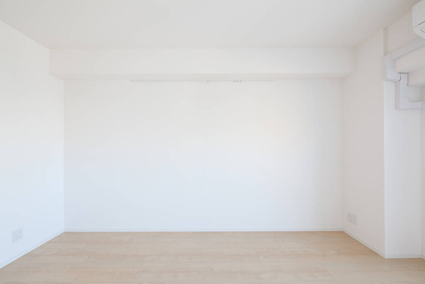 Living space and wall in a newly built apartment with no furniture - Photo, Image