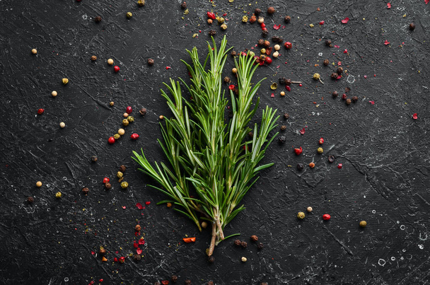 Fresh green rosemary on the table. Top view. - Foto, Imagem