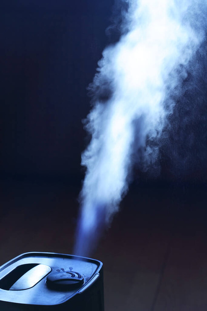 Closeup of home modern humidifier with white water steam - Photo, Image