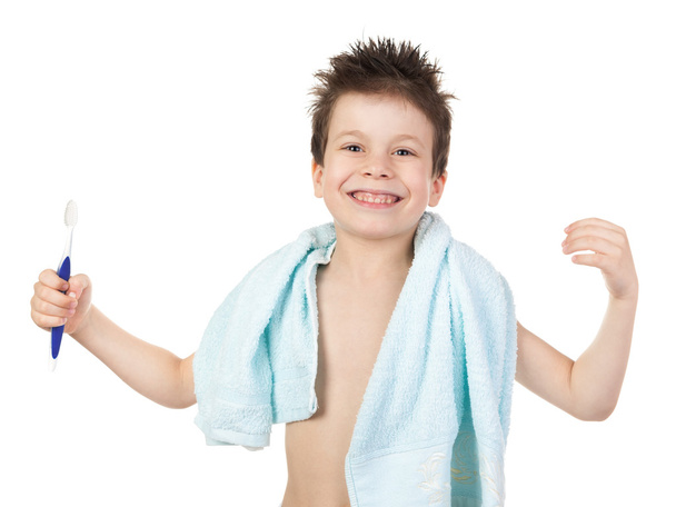 boy in towel with wet hair and toothbrush - Foto, Imagem