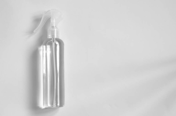 Hand antiseptic. Antiseptic bottle on a white background. Place for your text. - Photo, Image